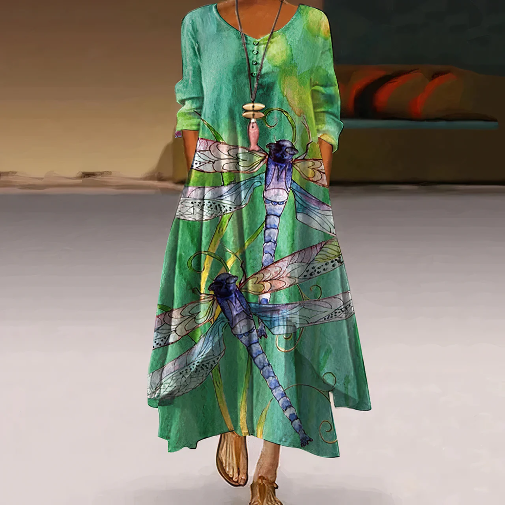 Langes Sommerkleid mit Blumenmuster und halblangen Ärmeln für einen stilvollen Auftritt