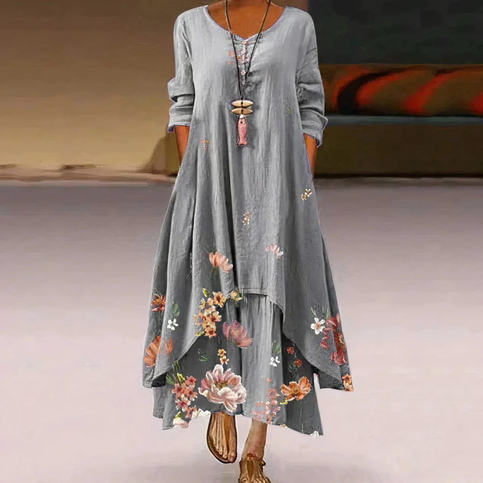 Langes Sommerkleid mit Blumenmuster und halblangen Ärmeln für einen stilvollen Auftritt