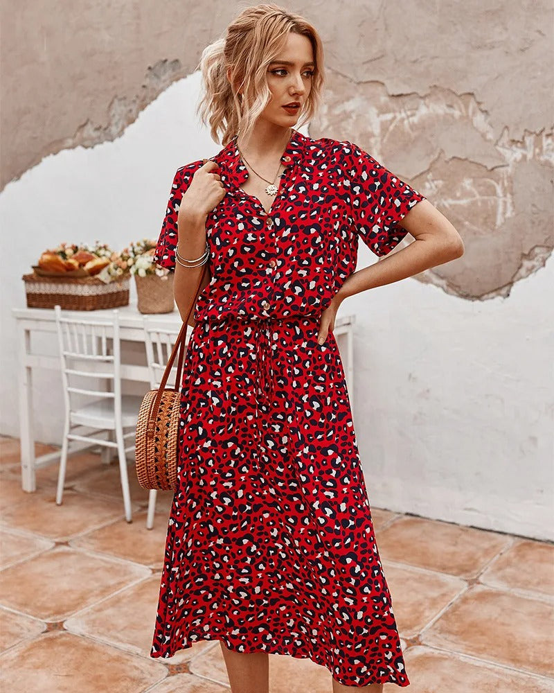 Elegantes Midikleid mit kurzen Ärmeln Knopfleiste und Punktemuster