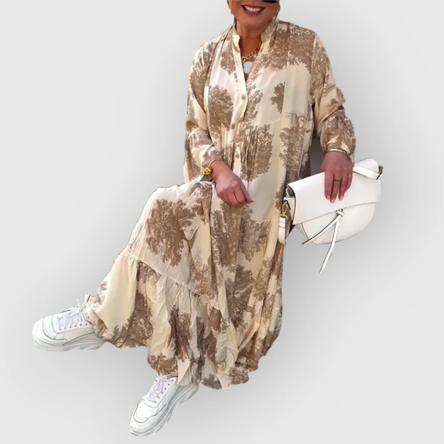 Elegantes langes Kleid mit weitem Schnitt langen Ärmeln und Boho Stil