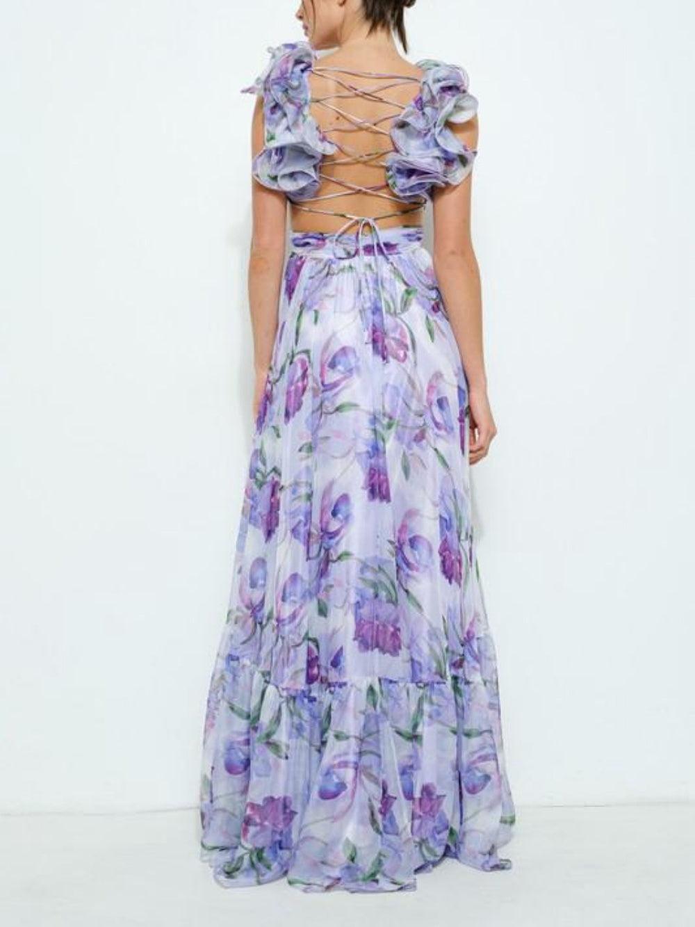 Langes Kleid mit Rückenausschnitt und zartem Blumenmuster im femininen Look
