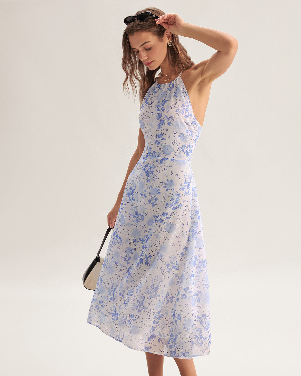 Midi Kleid mit Blumendruck und stilvollem Nackenträger Schnitt
