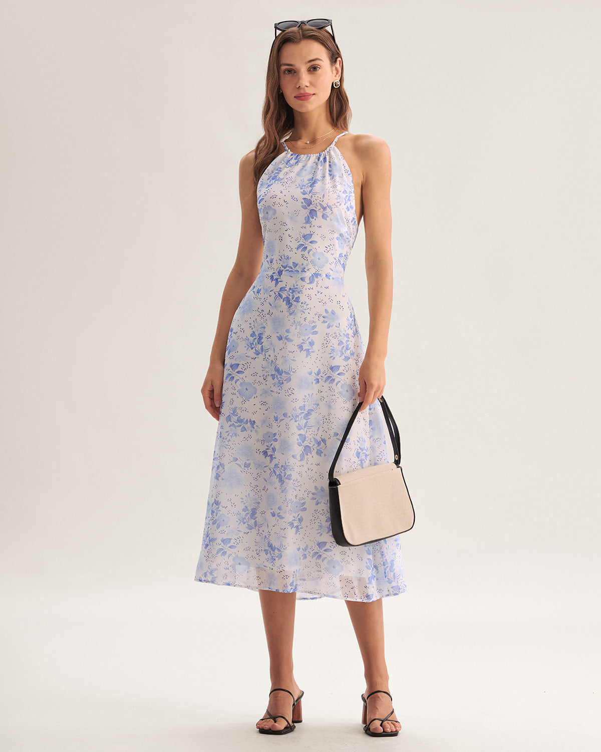 Midi Kleid mit Blumendruck und stilvollem Nackenträger Schnitt