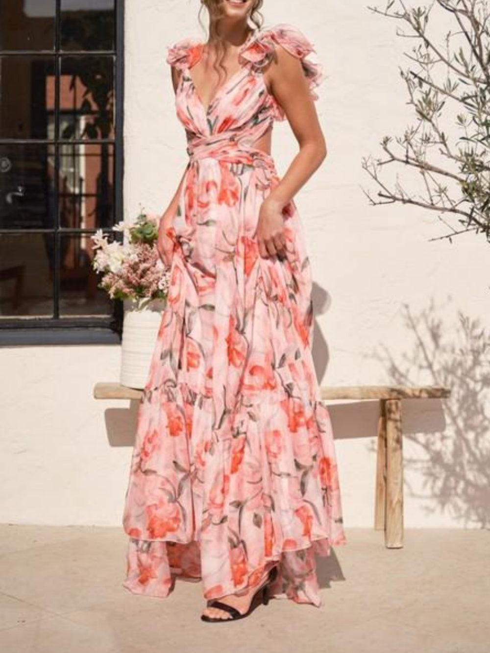 Langes Kleid mit Rückenausschnitt und zartem Blumenmuster im femininen Look